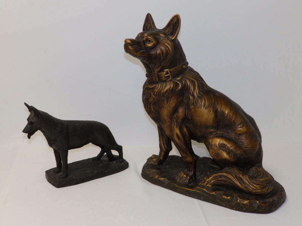 A large early 20thC bronzed terracotta study of a seated French Police Dog Alsatian by Thomas