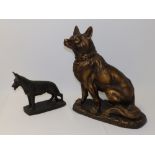 A large early 20thC bronzed terracotta study of a seated French Police Dog Alsatian by Thomas