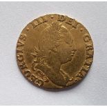 A George III gold half sovereign - 1786.