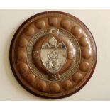 An Arts & Crafts silver mounted embossed copper trophy plaque by Agnes Vyse (born 1874), fixed to