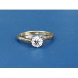 A diamond solitaire ring, the claw set brilliant weighing 0.55 carat, on yellow 18ct shank. Finger