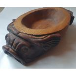 An Eastern carved wood bowl, possibly Chinese, 18" across.