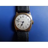 A 1930's 9ct gold Rolex wrist watch with silvered dial, chronometer movement, the 27mm wide case