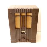 A Tecalemit art deco brown bakelite radio, 16.5" high.