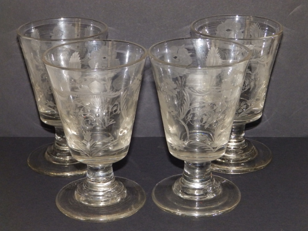 A set of four 19thC engraved glass heraldic presentation bucket rummers, each bearing three initials