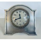 An art deco silver strut clock with 8 day Swiss movement, machine-turned decoration, Adie