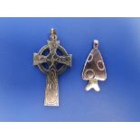 A yellow metal Celtic cross pendant, 1.6" and one other. (2)