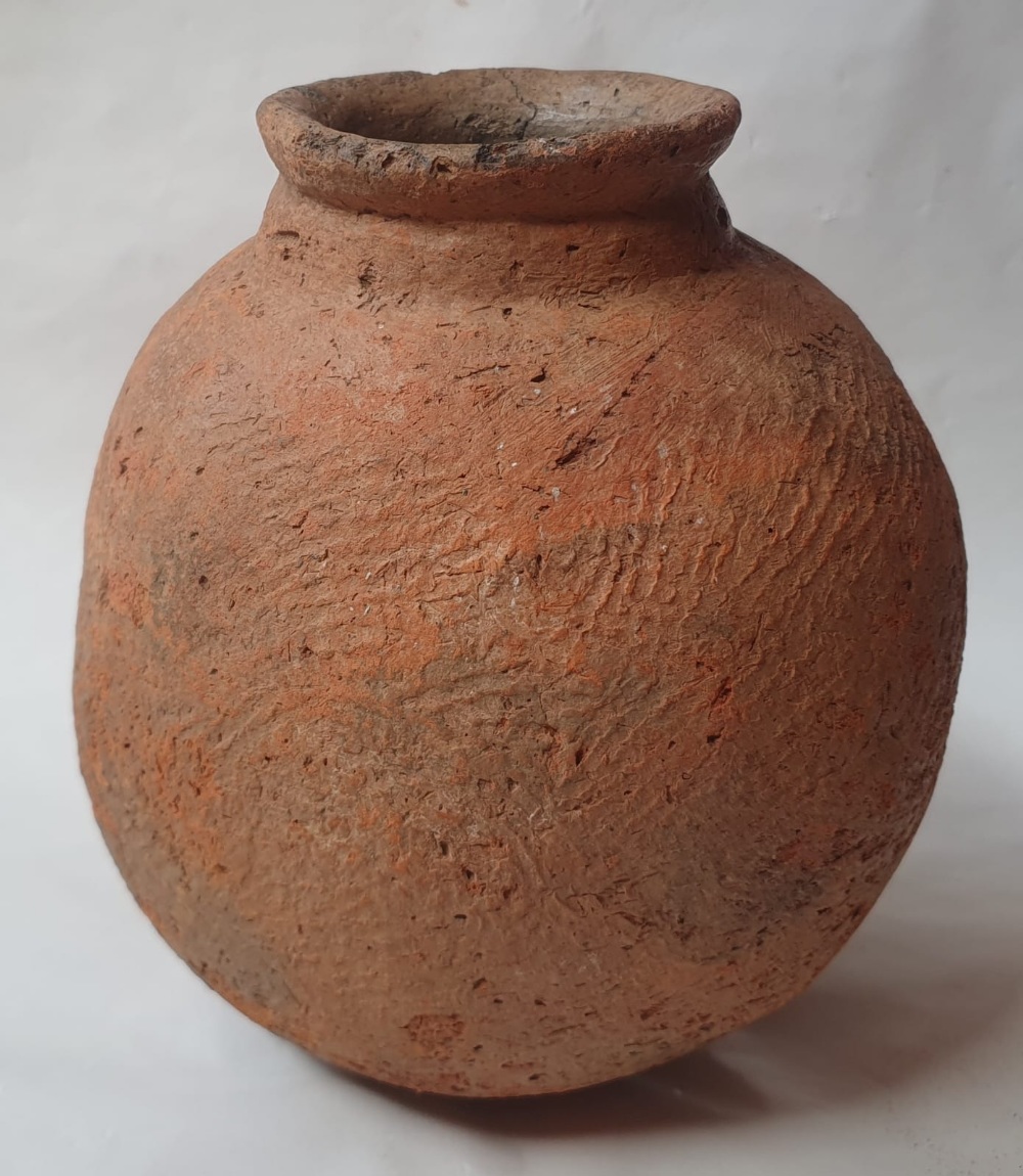 An early pottery globular bowl, possibly pre-historic, 8.5" high.