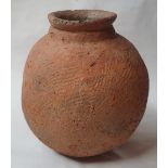 An early pottery globular bowl, possibly pre-historic, 8.5" high.