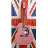 A pink Swift guitar signed in silver by the Sex Pistols' lead singer Johnny Rotten (John Lydon),