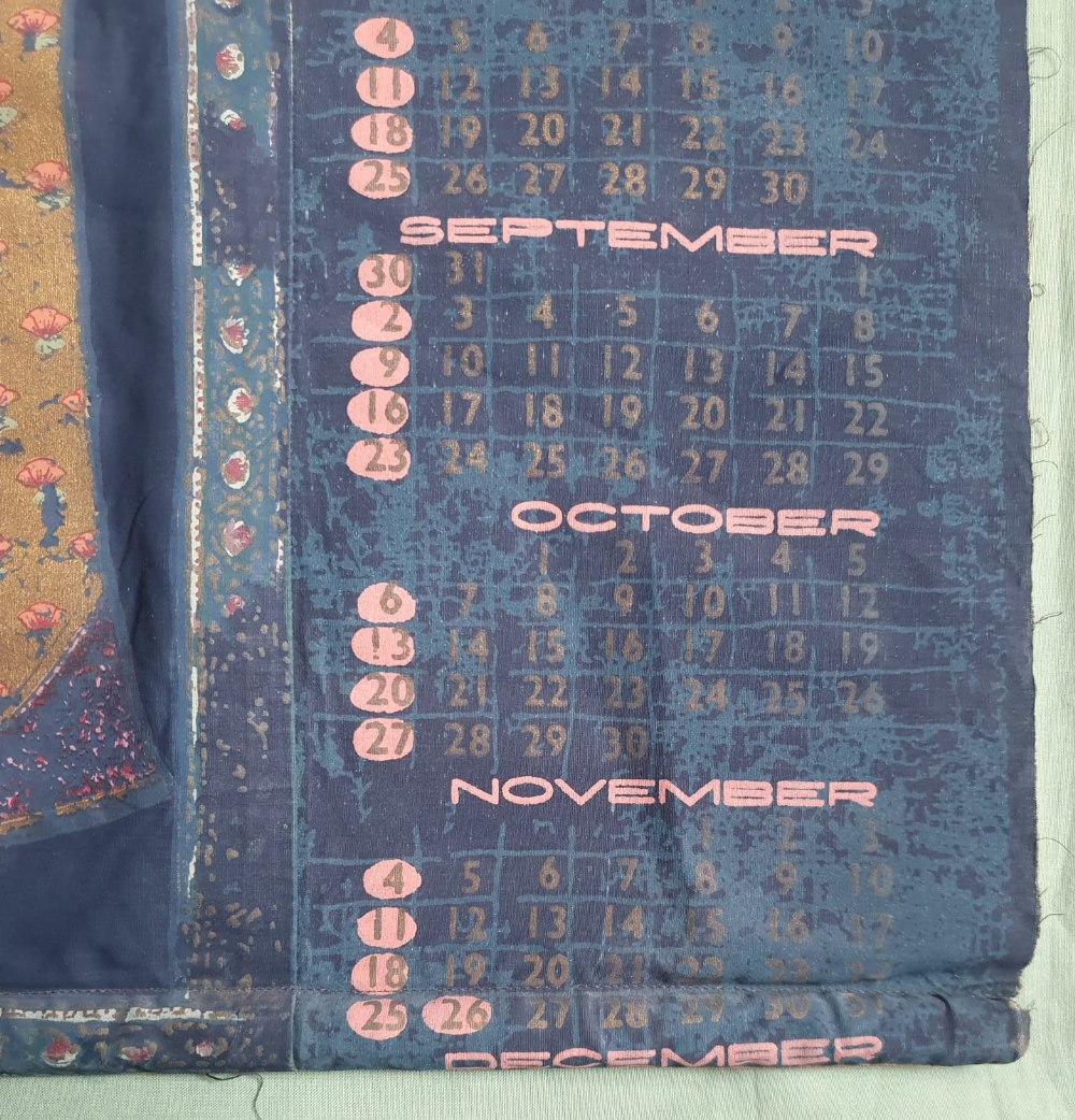 An Indian painted fabric hanging depicting two figures and a 1960's calendar, 31.5" x 24". (2) - Image 5 of 5