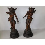 After Moreau - a pair of Victorian bronze patinated spelter figures - 'Espieglerie' - Cupid &