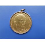 A gold Israeli medal commemorating 'The First President Dr. Chaim Weizmann 1874-1952', the reverse