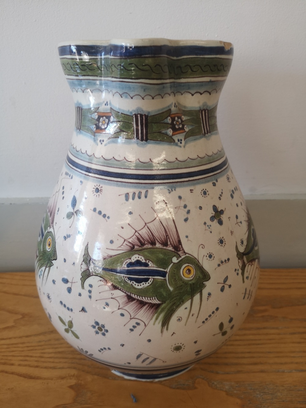 A Cantagalli maiolica jug decorated with fish in green and blue with small flowerheads, blue - Image 2 of 5