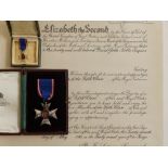 A Member of the Royal Victorian Order medal, 5th Class, with miniature & Citation, awarded to