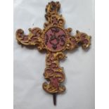 A 17th/18thC carved gilt wood cross, having deeply carved decoration, 21".