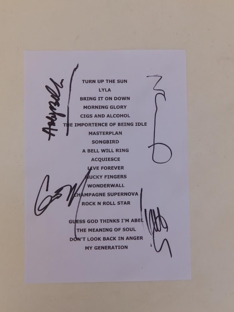 A signed Oasis set list, beginning with 'Turn Up The Sun' and ending with 'My Generation', signed by