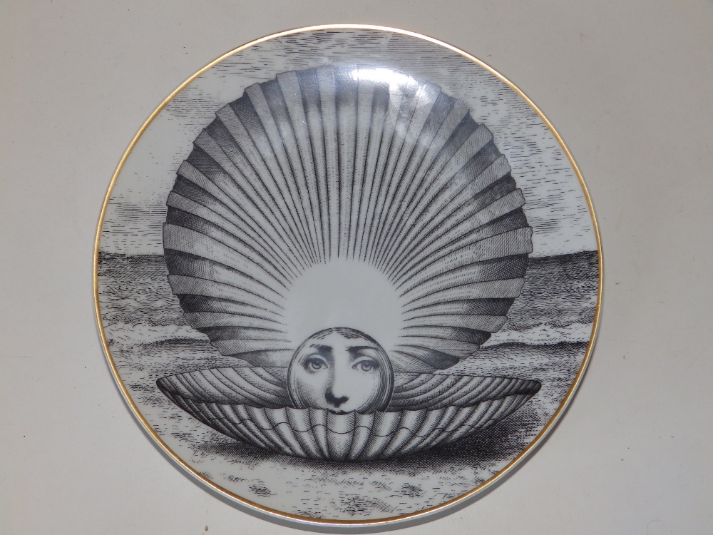 A Fornasetti 'Temi & Variazioni' Motiv 14 porcelain wall plate by Rosenthal, of pearl in oyster