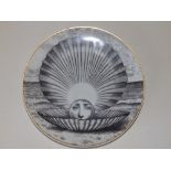 A Fornasetti 'Temi & Variazioni' Motiv 14 porcelain wall plate by Rosenthal, of pearl in oyster