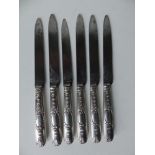 A set of six late 19th/early 20thC French silver-handled dinner knives by Andre Aucoc of Paris, in