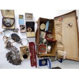 A leather case and contents costume jewellery.