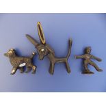 A small bronze poodle by Walter Bosse, 2.5" across and two other Bosse figures. (3)