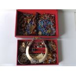 A modern red jewellery box & contents.