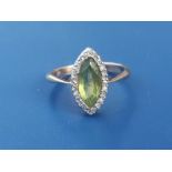 A peridot & rose cut diamond marquise cluster ring on 9ct shank. Finger size J.