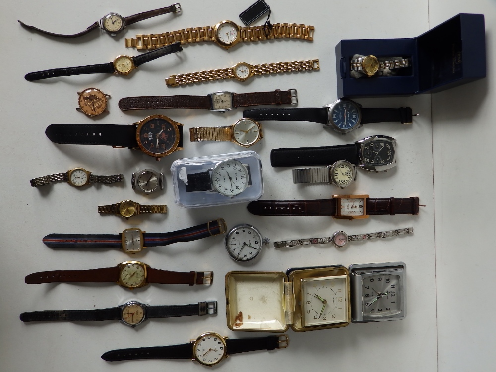 A large collection of modern wrist watches and others.