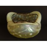 An art nouveau pale green opalescent glass rose bowl of trefoil plan with milky rim & trailed