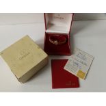 A boxed lady's 9ct gold Omega bracelet wrist watch with original guarantee dated 1970 - bracelet