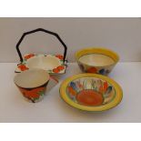 A Clarice Cliff Woodland pattern teacup - minor rim chips, two Crocus pattern bowls, 5.5" & 6.5"