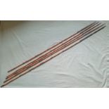 Five Southeast Asian arrows bearing painted designs, the longest 56".