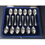 A cased set of 12 silver coffee spoons - CB&S, Sheffield 1918.