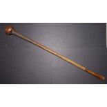 A 19thC South African knobkerrie, with spiralled decoration, binding to one end, 31".