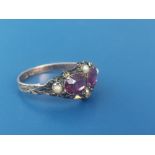 A small early 20thC amethyst & pearl gold ring, Birmingham marks. Finger size I/J - repaired.