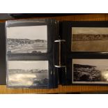 Two albums containing approximately 200 early 20thC postcards depicting views of Teignmouth.