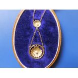 A boxed small pearl set shell-moulded pendant necklace, the drop 1.6mm diameter - '9ct'.