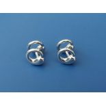 A pair of Tiffany & Co. Elsa Peretti 'Eternal Circle' platinum cufflinks, 16mm across.