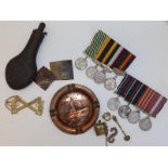 A small collection of military related items including two Eastern medal groups.