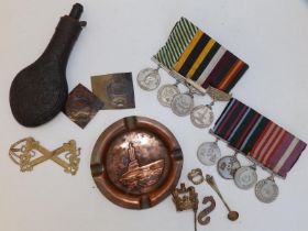 A small collection of military related items including two Eastern medal groups.