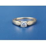 A small 9ct gold diamond solitaire ring. Finger size L/M