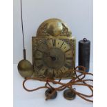 An antique brass dial 30 hour wall clock by John Reed of Yeldham, the 8" arched brass dial with