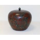 An Oriental lacquered spherical spice jar, 8" overall height - a/f.