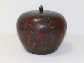 An Oriental lacquered spherical spice jar, 8" overall height - a/f.