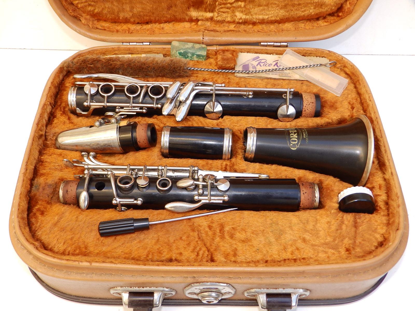 A Corton clarinet in fitted case.