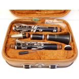 A Corton clarinet in fitted case.