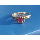 A certified natural ruby solitaire ring, the oval cut stone in four-claw setting on yellow 14K