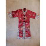 A mid 20thC Chinese robe in embroidered red & white silk.