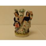 A Victorian Staffordshire figure group - Highland couple with harp, 8.2" high.